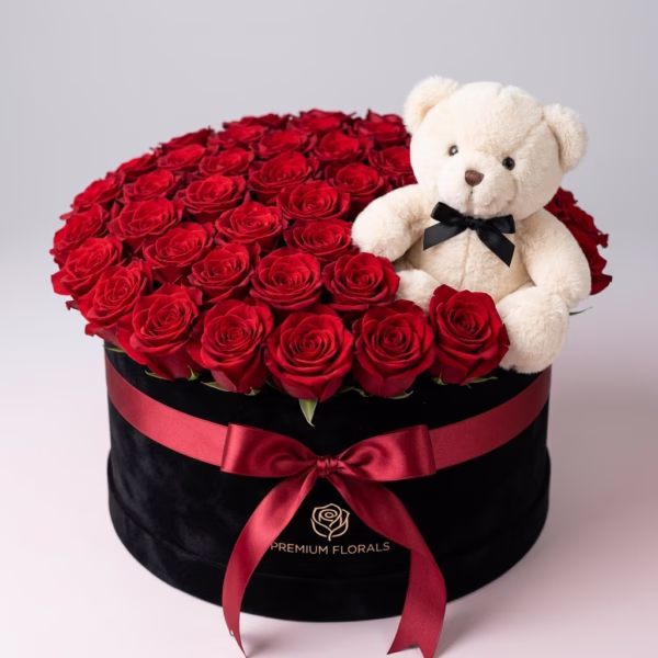 ¡100 Rosas de Amor en Caja Premium con Peluche Amigo!